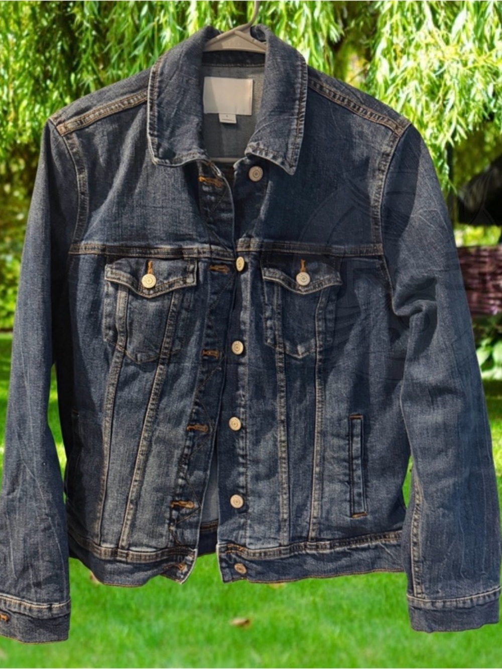 Jean jacket with gigantic SKULL crystal embellishment on back.